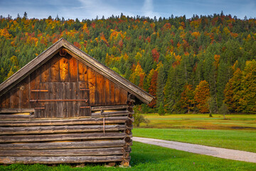Bavarian alps autumn and wooden barn at sunset, Garmisch Partenkirchen, Germany