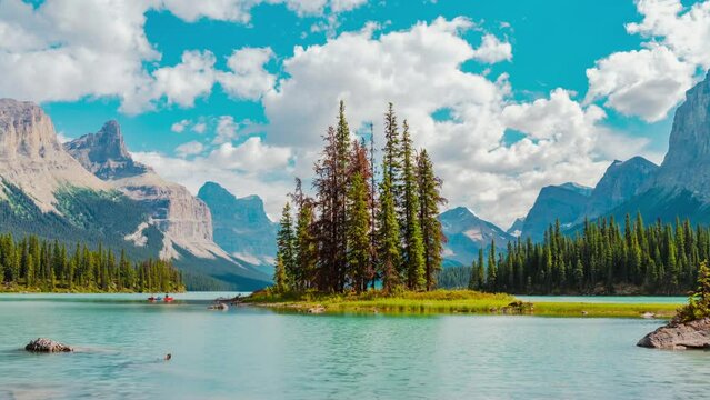 4K time-lapse UHD video of iconic Spirit Island on Maligne Lake during summer, Jasper National Park, Alberta, Canada, pan timelapse view from left to right