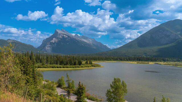 4K time-lapse UHD video of Vermilion Lakes with Mount Rundle and Sulphur Mountain in the background, Alberta, Canada. summer autumn foliage scenery in Banff National Park, Canadian Rockies