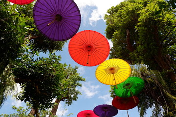 Umbrellas hanging in the sky