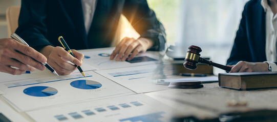 Businessman holding pen, financial analysis on paper and judge holding hammer, finance and law...