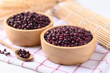 Azuki beans, Adzuki bean or red mung beans in wooden bowl, Food ingredients in many Chinese dishes and filling in Japanese sweet