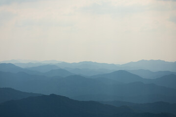 Ridge under the misty sky. 