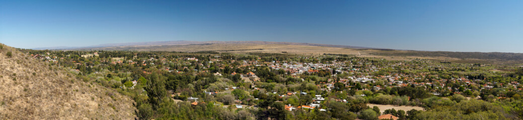 Fototapeta na wymiar Summer morning landscape of small town La Cumbre, Cordoba. Taken from the top of a hill