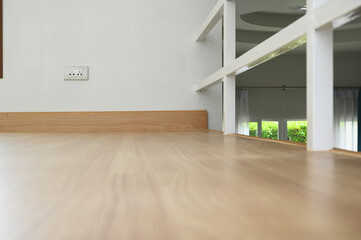 wooden floor with white handrail