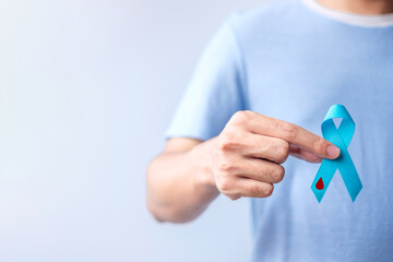 World Diabetes day Awareness month, Blue Ribbon with blood drop shape for supporting people living,...