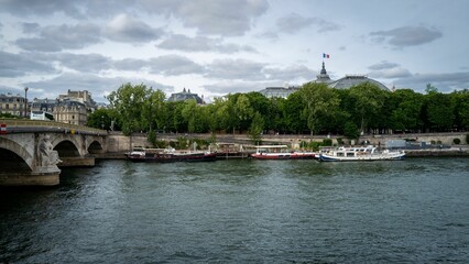 Scenic landscape view of boats on the river Seine in Paris, France