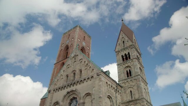 Ribe Cathedral Church in Denmarks oldest City against blue Sky. 4K.