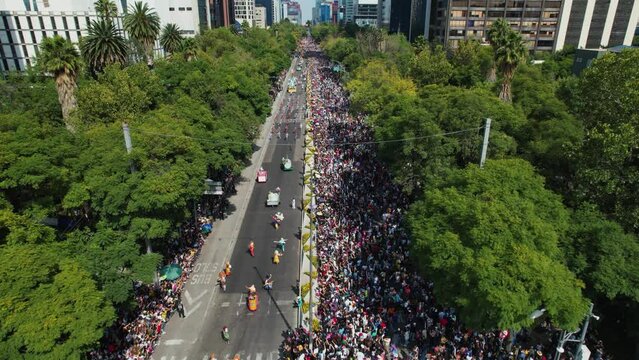 Aerial view overlooking the Dia de los Muertos parade on Paseo de la Reforma. in Mexico city