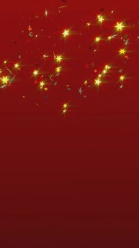 Roter Hintergrund zum Weihnachten mit herunterrieselnden Sternchen