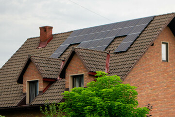 Fototapeta na wymiar Historic farm house with modern solar panels