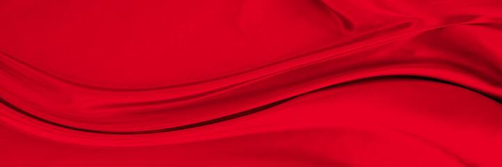 Black red satin dark fabric texture luxurious shiny that is abstract silk cloth background with...