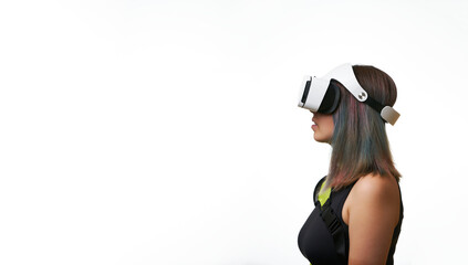 Woman is using virtual reality headset. Concept of virtual, augmented and extended reality and metaverse.