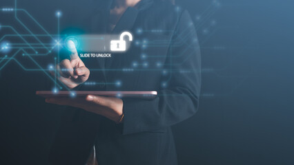 Businessman's hands are scanning fingerprints to unlock system access, identification to secure access to personal data, cyber security, data management.