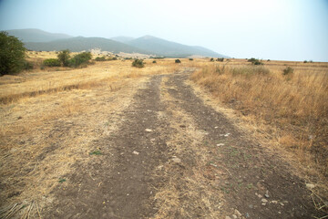 Ground road in nature. Armenia. Autumn