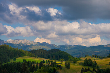 Obraz premium Mountain landscape with clouds