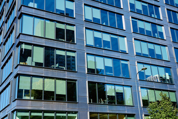 City architecture. Facade of modern office buildings at summer day