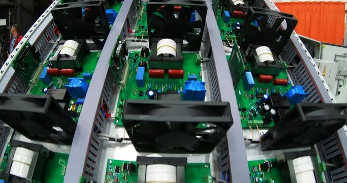 Processor chip and cooler fan on the motherboard. High-tech processing of the electronic circuit board server code. Microchip processor for mining.