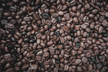 roasted coffee beans, brown background