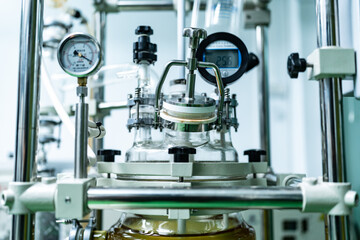 Cannabis ganja CBD oil scientific extraction machine, medicine factory technology for scientist worker in work of hemp plants process laboratory. chemical production equipment concept