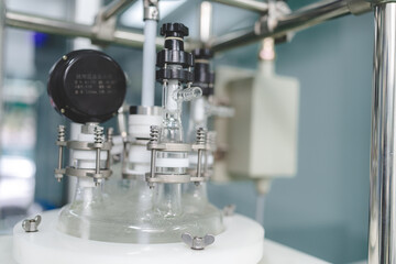 Cannabis ganja CBD oil scientific extraction machine, medicine factory technology for scientist worker in work of hemp plants process laboratory. chemical production equipment concept