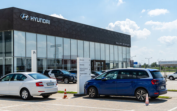 Hyundai dealership with cars outside. Hyundai logo and name car manufacturer on facade of building in Mega Adygea. Krasnodar, Russia - August 04, 2022