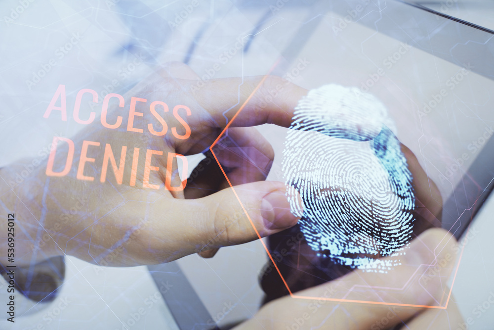 Poster Double exposure of man's hands holding and using a digital device and fingerprint hologram drawing. Security concept.