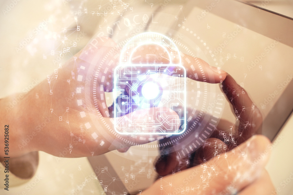 Aufkleber Multi exposure of man's hands holding and using a digital device and lock drawing. Security concept.