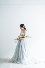 Fototapeta premium ウェディングドレスを着た花嫁