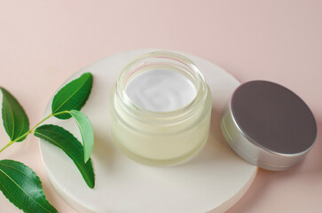 Open jar of body moisturizer. Moisturizing cream white packaging mockup. The concept of natural beauty products for spa treatments.
