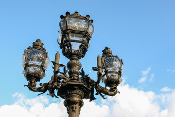 Fototapeta na wymiar Ornate Street light in Paris, France