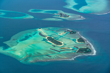 Fototapeta na wymiar Aerial view of Dhigu, Bushi and Moyo Island, Maldives with the Anantara Maldives Resorts, Maldive Atoll - bird eyes view
