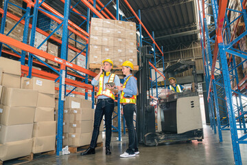 Naklejka na ściany i meble Caucasian man, woman warehouse supervisor discuss and use tablet check package with forklift driver worker load box on shelf, product distribution inventory management,Logistics shipping business plan