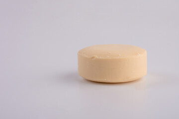 Close-up of hygiene soap piece, isolated on white background