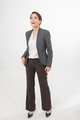 Studio portrait photo of a young beautiful elegant Brazilian female businesswoman lady wearing smart casual business attire suit posing with a series moments of emotion and gesture for all application