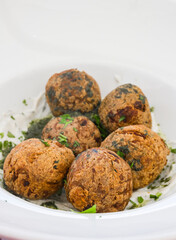 Fried falafel balls with sauce