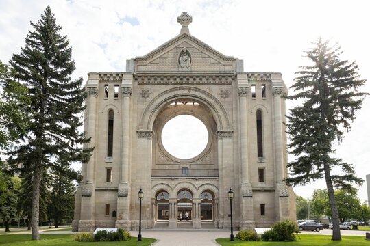 St. Boniface Cathedral with blue cloudy sky in the background Winnipeg, Manitoba, Canada