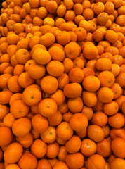 Oranges. Heap of oranges. Oranges background.