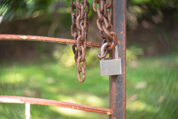 Chain and lock on the iron fence