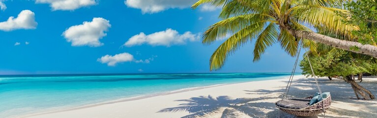 Tropical beach panorama as summer relax landscape with beach swing or hammock hang on palm tree...