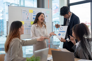 Group of young Asian business creative development planning strategy meeting and presentation at company sales strategy marketing conference.