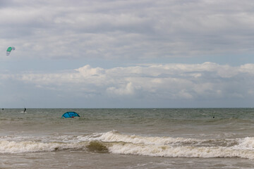 Fototapeta na wymiar kite surfing on the beach