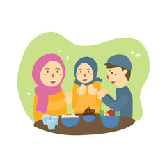 Moslem family enjoying ramadan iftar together in happiness during fastin