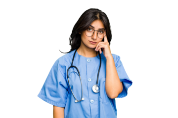 Young nurse Indian woman isolated pointing temple with finger, thinking, focused on a task.