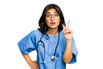 Young nurse Indian woman isolated having an idea, inspiration concept.