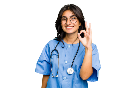Young nurse Indian woman isolated cheerful and confident showing ok gesture.