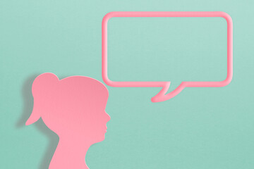 pink lady icon paper cut with speech bubble frame on grunge green background with copy space