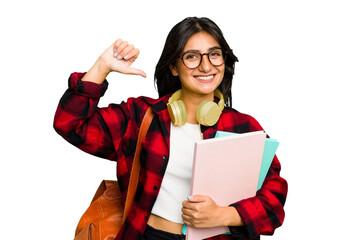 Young student Indian woman wearing headphones isolated feels proud and self confident, example to...