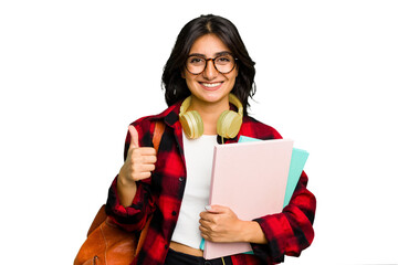 Young student Indian woman wearing headphones isolated smiling and raising thumb up