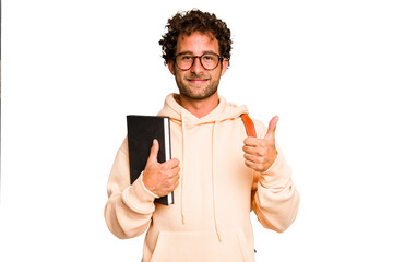 Young caucasian student man isolated smiling and raising thumb up
